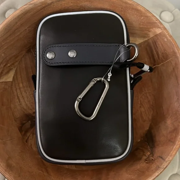 Coach north/south leather pouch